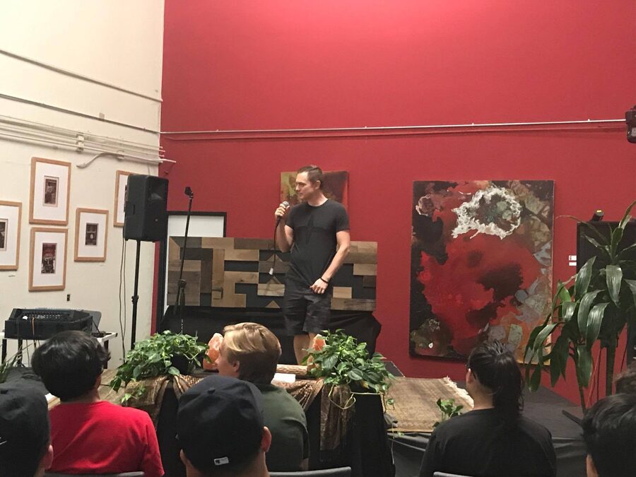 John Bush presenting to a classroom of students